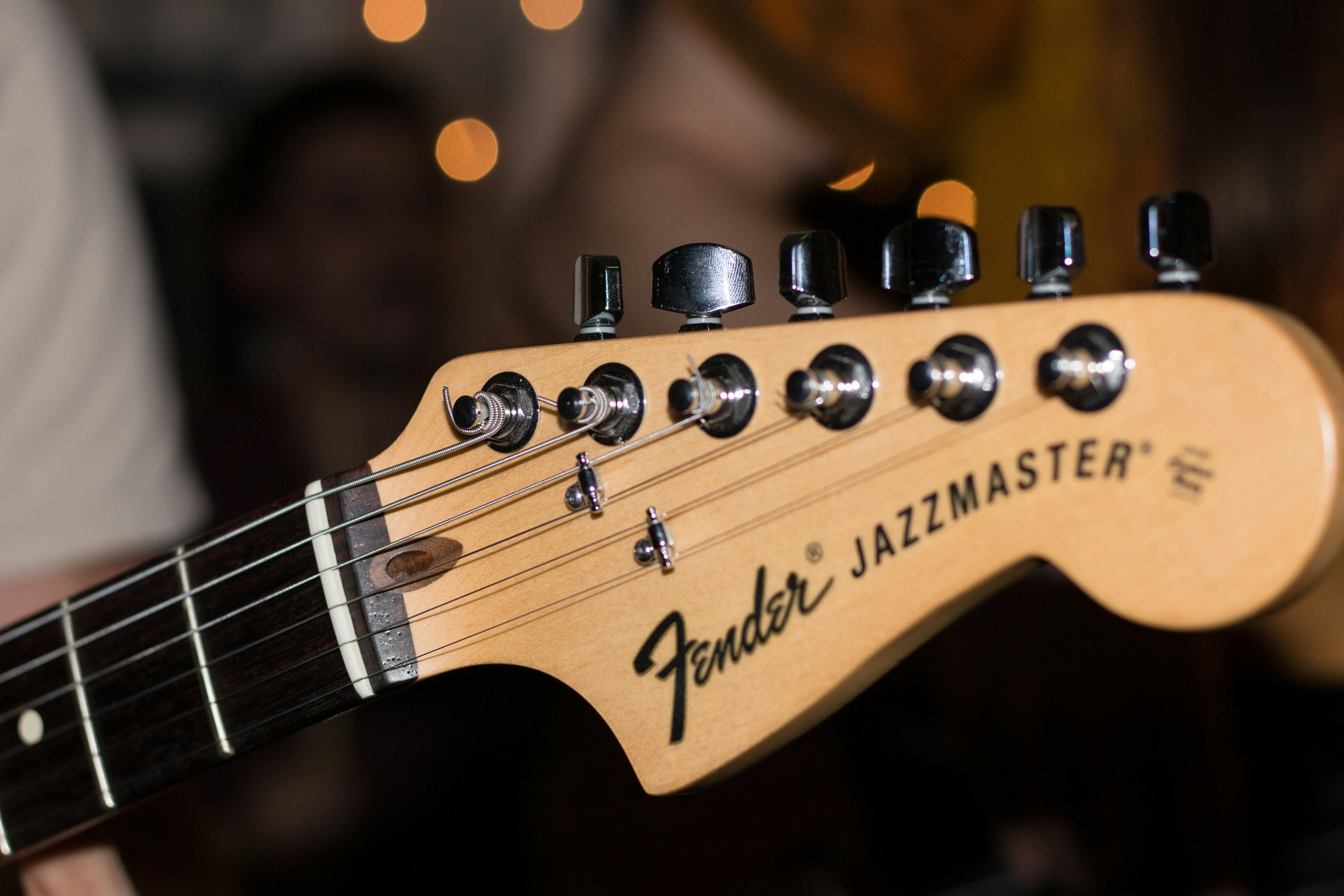 photo of brown Fender Jazzmaster guitar headstock